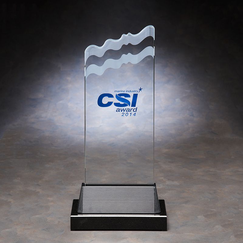 Glass award with wavy top and blue text "marine industry CSI award 2014" on a rectangular dark base.

